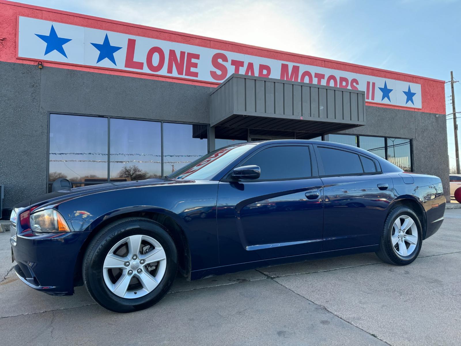 2014 BLUE /Gray DODGE CHARGER SE 4dr Sedan (2C3CDXBGXEH) with an 3.6L V6 engine, Automatic 5-Speed transmission, located at 5900 E. Lancaster Ave., Fort Worth, TX, 76112, (817) 457-5456, 0.000000, 0.000000 - This is a 2014 Dodge Charger SE 4dr Sedan that is in excellent condition. All power windows, door locks and seats. Ice cold AC for those hot Texas summer days. It is equipped with a CD player, AM/FM radio, AUX port, Bluetooth connectivity and Sirius XM radio capability. Apply for financing today! - Photo #0